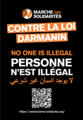autocollant personne nest illegal À Paris, marche contre la loi Darmanin