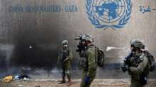 israeli soldiers seen near the unrwa headquarters in gaza city Ce qu’il faut savoir de la réponse des Nations Unies au conflit au Proche-Orient